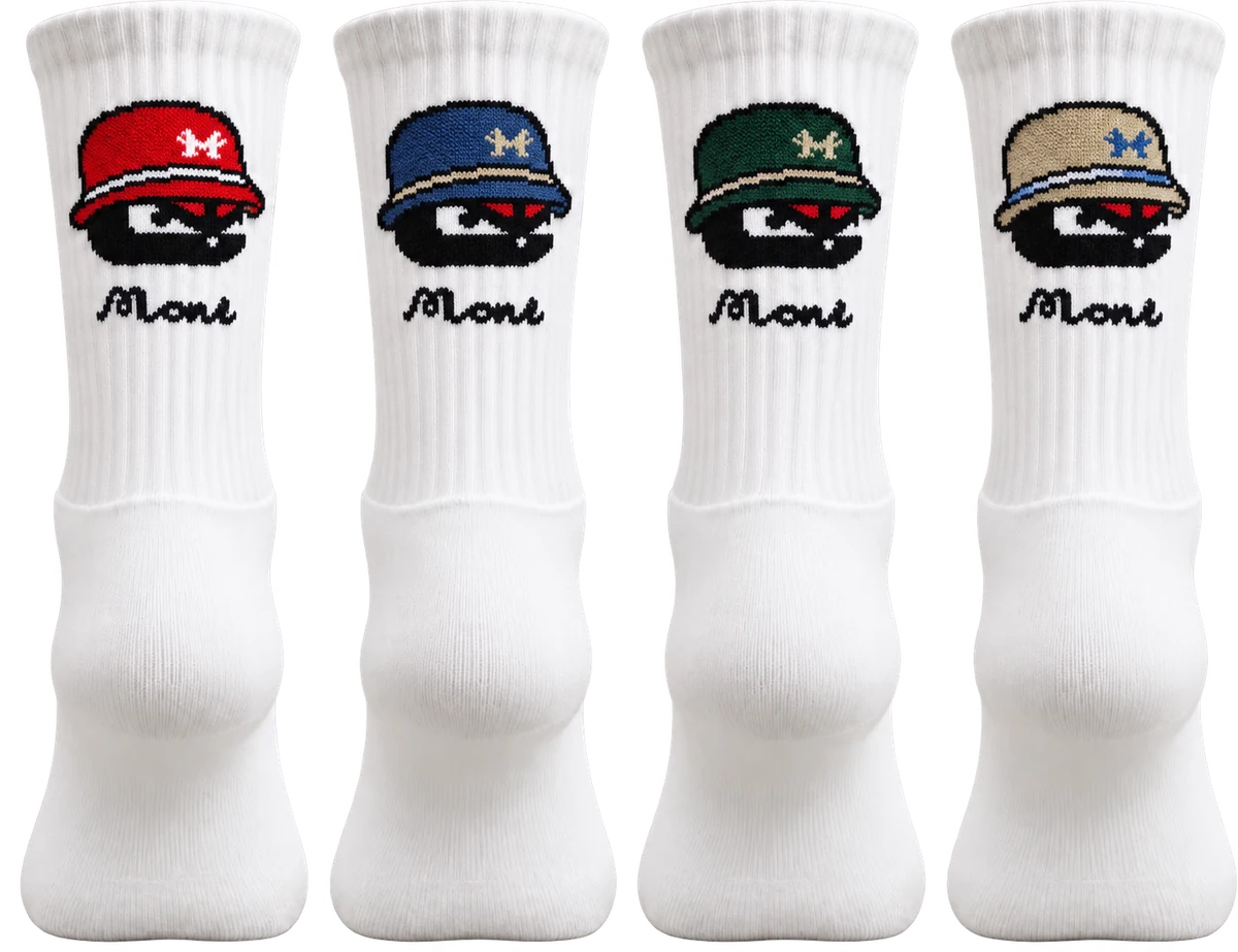 Four long MONS socks shown from the rear with full cuff logos, ordered red, blue, green and beige